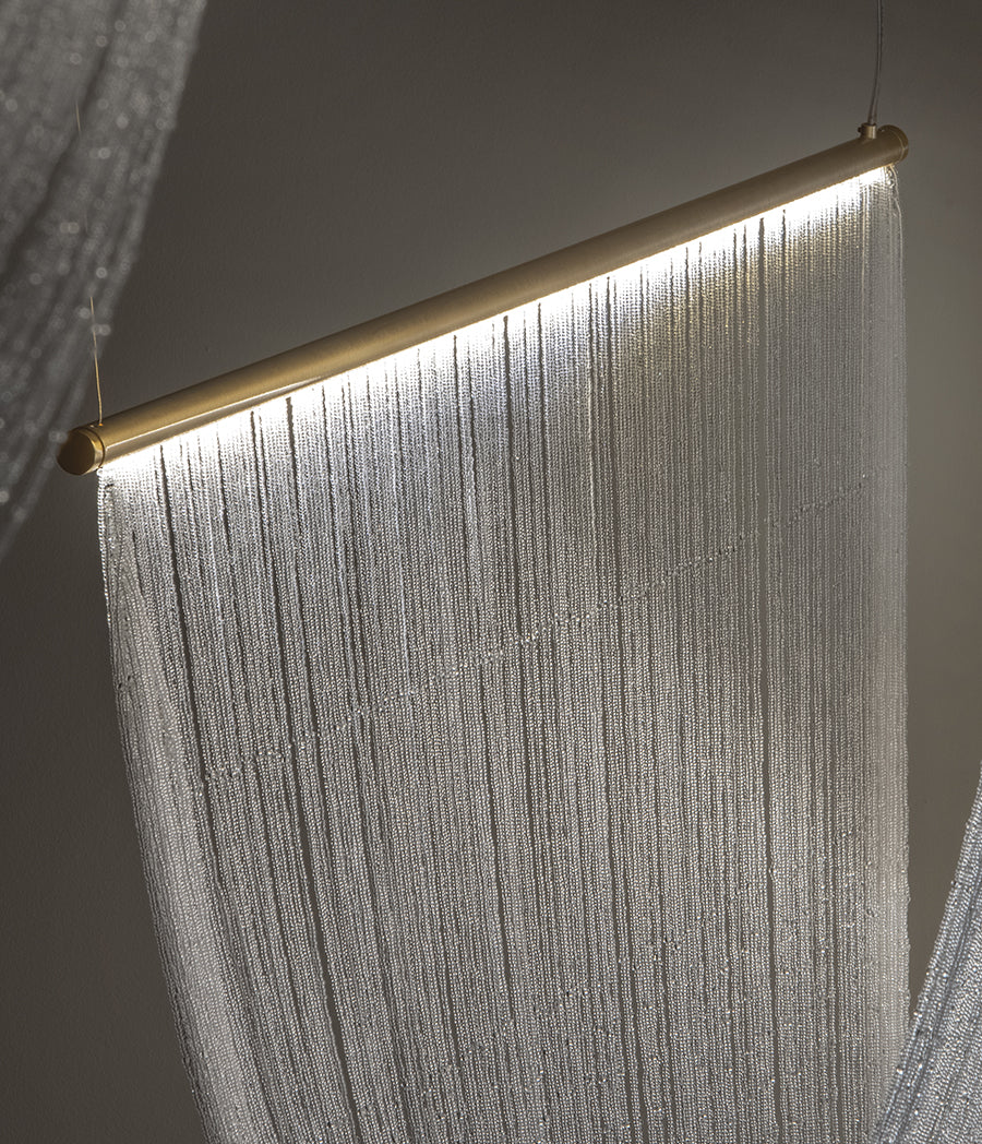 Pendant lamp with hand-sewn crystal spheres