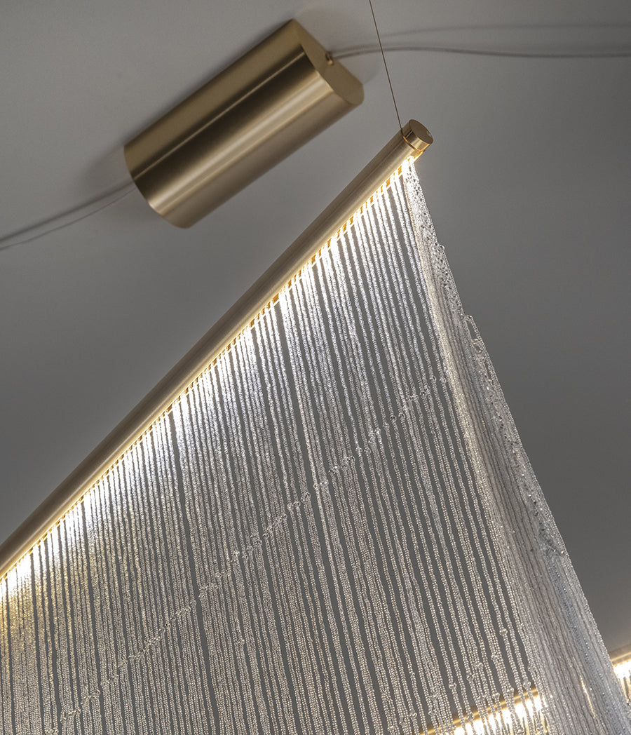 Pendant lamp with hand-sewn crystal spheres