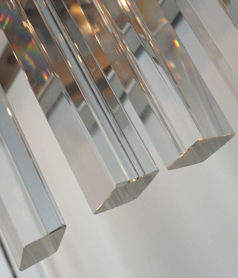 Lampadario in cristallo con aste di forma romboidale